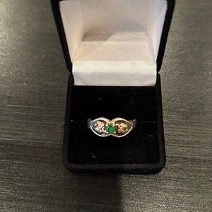 Green garnet stone set in Black Hills Gold style, size 9 3/4.